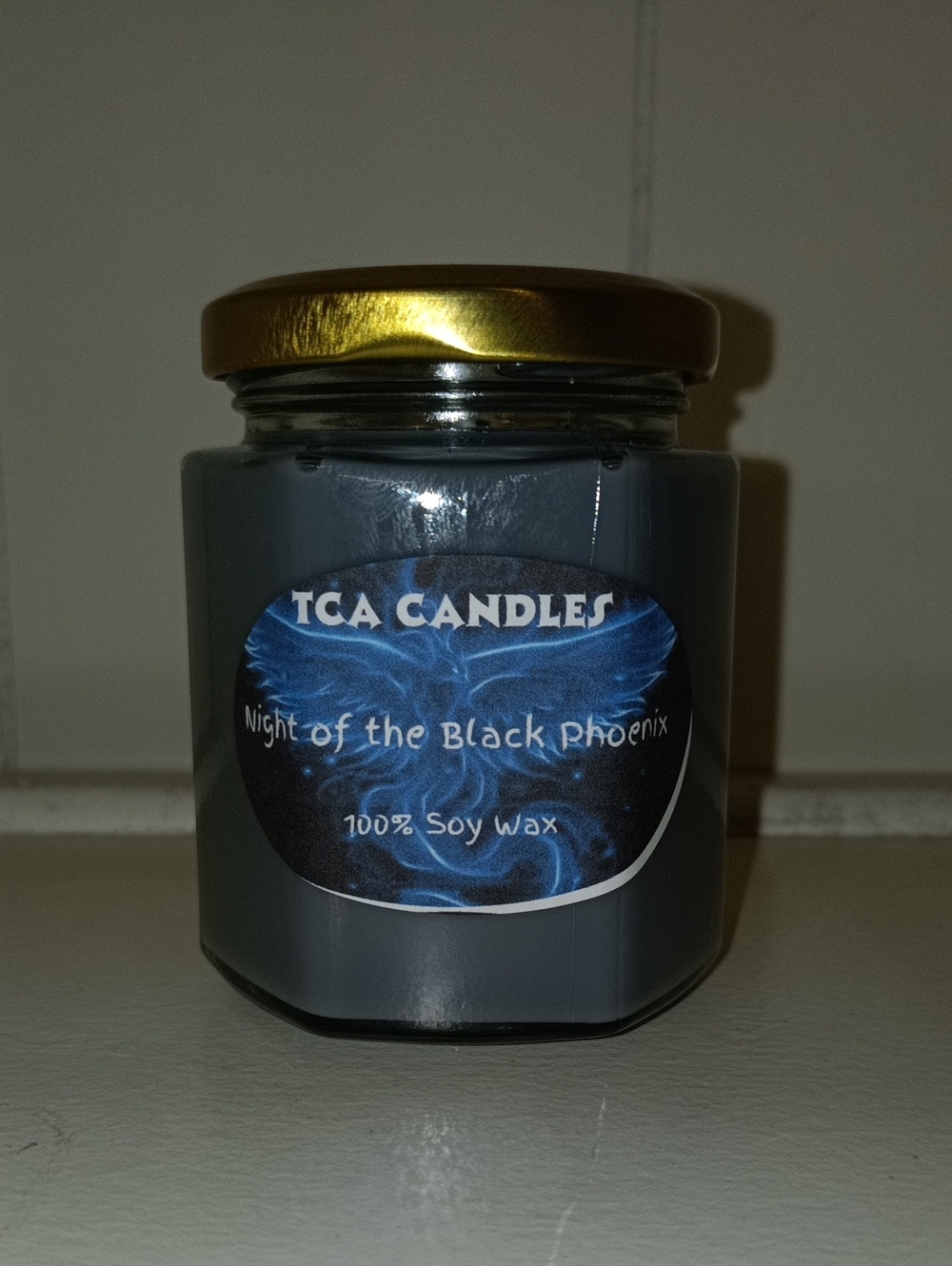Night of the Black Phoenix Candle — Black Jar with Gold Lid